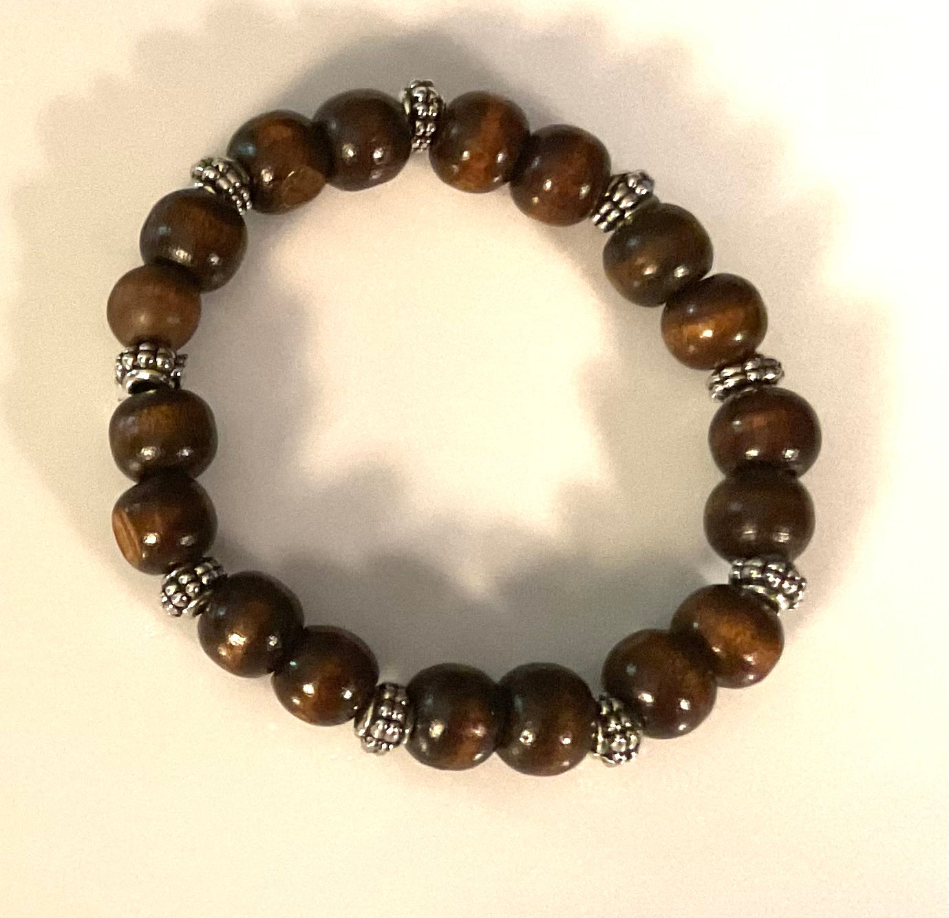 Dark Brown Wood Bead Bracelet with Silver Flowery Spacers