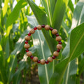 Wood Bead Bracelet with Light Red Glass Beads