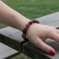 Dark Brown Oval Wood & Red Beaded Bracelet with Engraved Silver Spacers