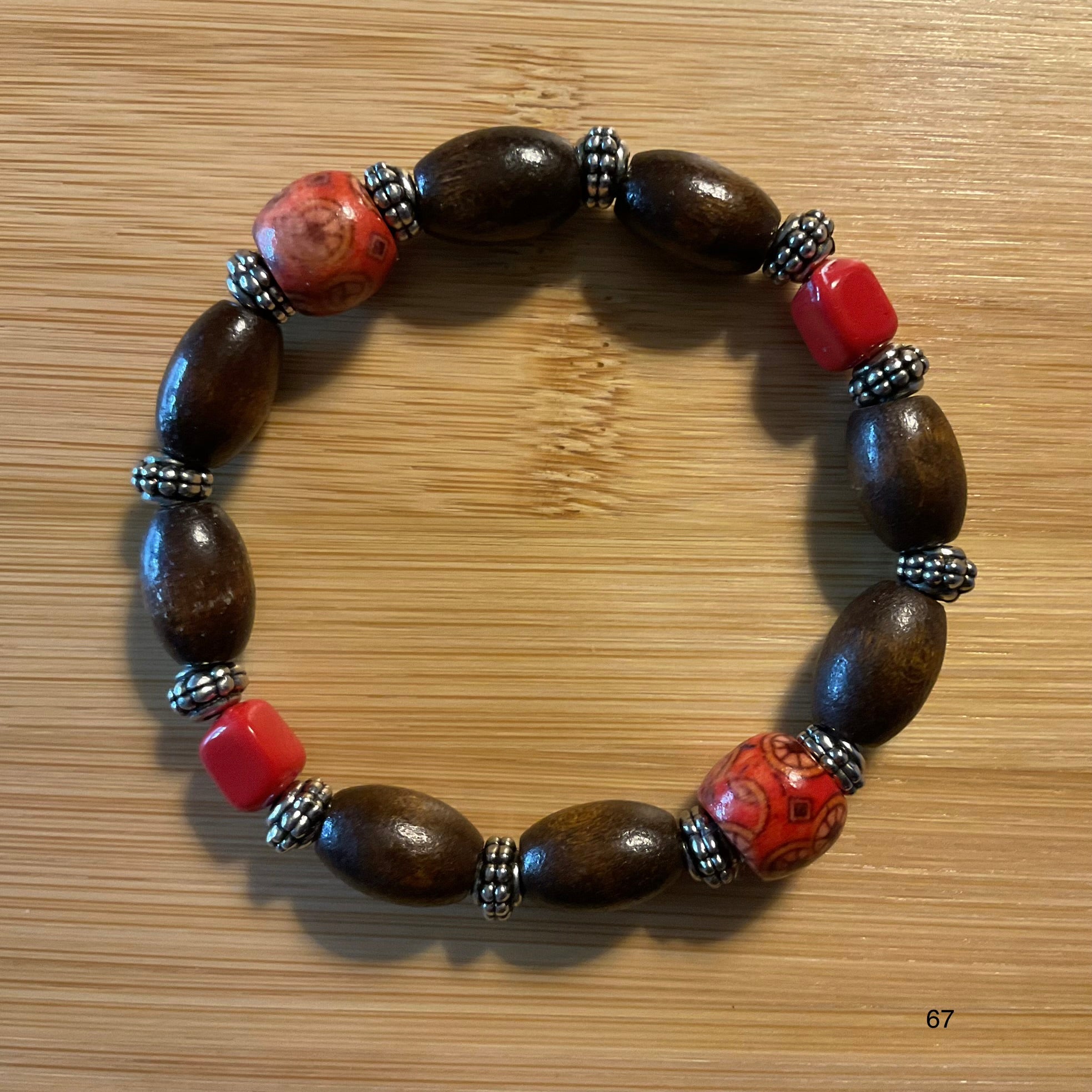Dark Brown Oval Wood & Red Beaded Bracelet with Engraved Silver Spacers